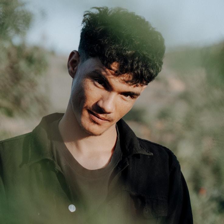 Portrait of Liam Calder, community mentor and Italian cuisine specialist